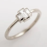 /public/photos/live/Three Stone Baguette Moissanite Thin Engagement Ring 863 (5).webp